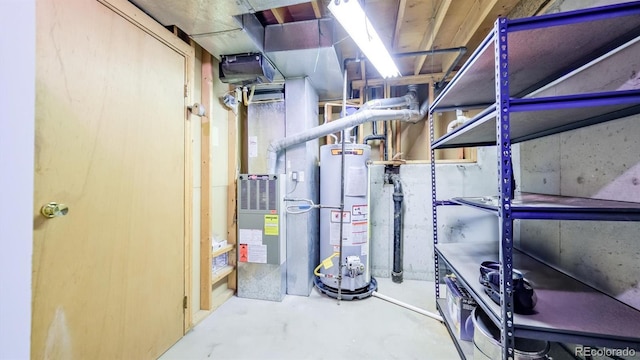 utility room with water heater