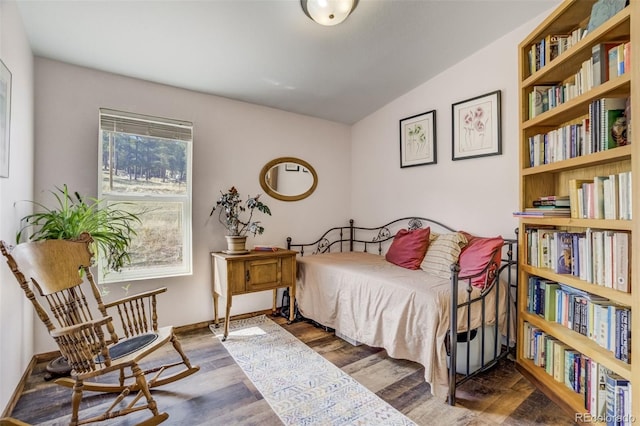 464 Hackamore Dr, Florissant, CO 80816 - bedroom featuring vaulted ceiling and wood finished floors