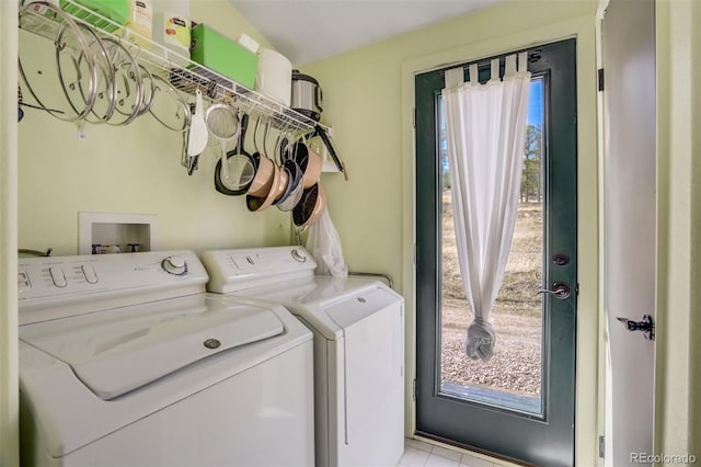 464 Hackamore Dr, Florissant, CO 80816 - washroom featuring washing machine and clothes dryer, laundry area, and light tile patterned floors