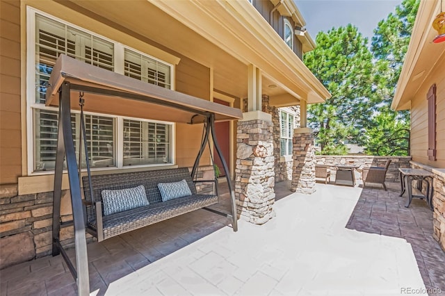 view of patio with an outdoor living space