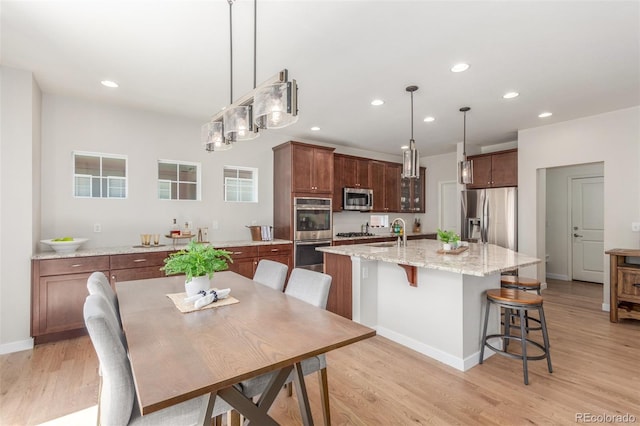 16694 Miners Way, Broomfield, CO 80023 - dining area featuring light wood-style flooring and recessed lighting