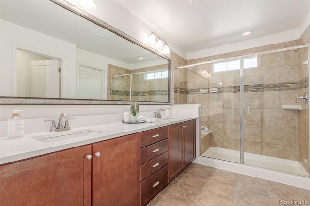 16694 Miners Way, Broomfield, CO 80023 - bathroom with double vanity, a stall shower, and tile patterned floors