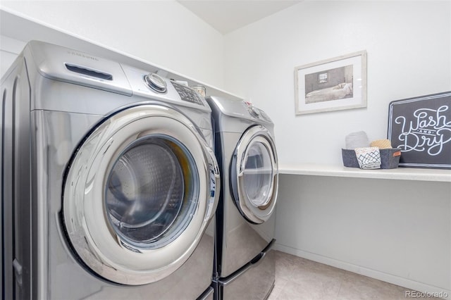 16694 Miners Way, Broomfield, CO 80023 - washroom featuring separate washer and dryer and tile patterned floors