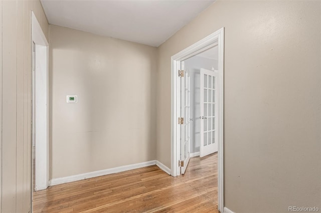 770 Havana St, Aurora, CO 80010 - hallway featuring light wood-type flooring and baseboards