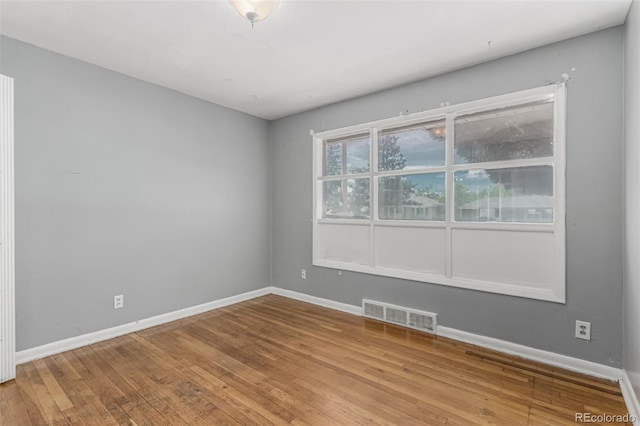 770 Havana St, Aurora, CO 80010 - unfurnished room featuring wood finished floors and baseboards