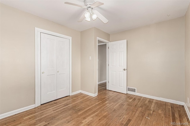 770 Havana St, Aurora, CO 80010 - unfurnished bedroom featuring light wood finished floors, baseboards, a closet, and ceiling fan