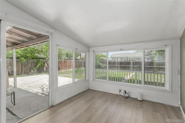 770 Havana St, Aurora, CO 80010 - unfurnished sunroom featuring lofted ceiling