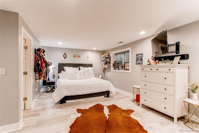 bedroom featuring light wood-type flooring