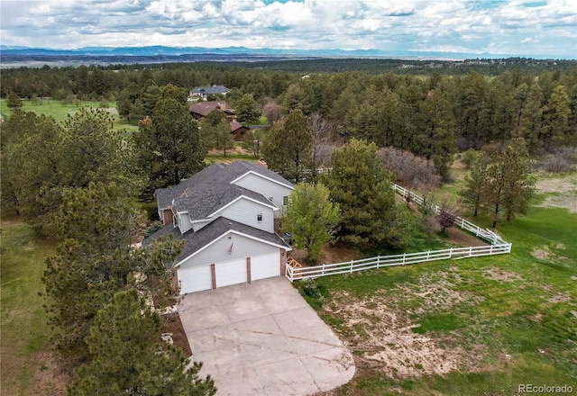 aerial view with a wooded view