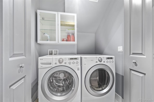 laundry area featuring laundry area and washer and clothes dryer