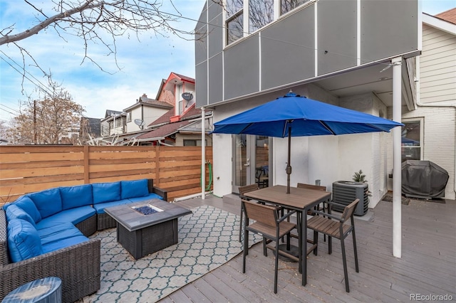 view of patio / terrace featuring outdoor dining area, cooling unit, a grill, fence, and an outdoor living space with a fire pit