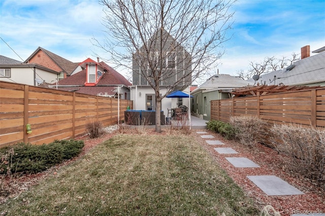 view of yard featuring a fenced backyard and a patio