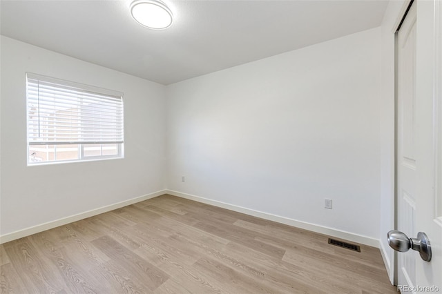 empty room featuring light hardwood / wood-style floors