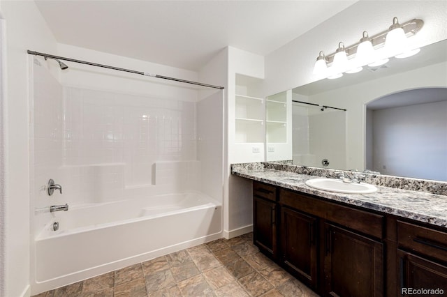 bathroom with vanity and shower / washtub combination