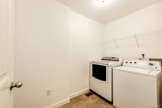 laundry area with washer and dryer