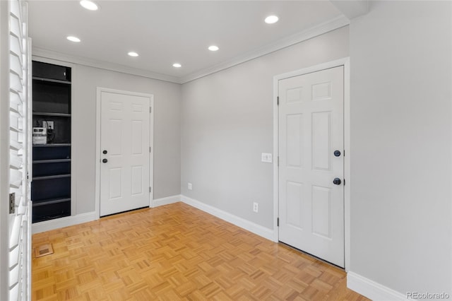 foyer featuring crown molding, recessed lighting, and baseboards