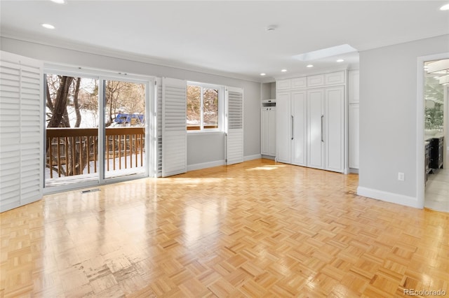 interior space with recessed lighting, baseboards, and visible vents