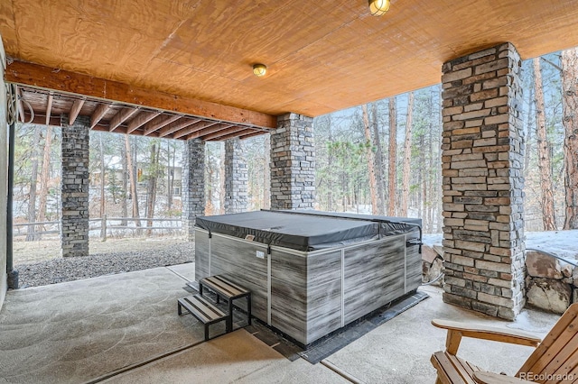 view of patio with a hot tub