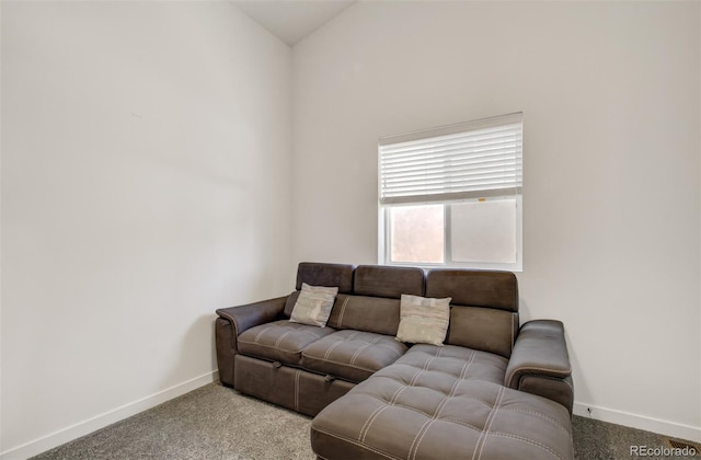 2734 Grand Prix Ct, Colorado Springs, CO 80922 - carpeted living room featuring baseboards