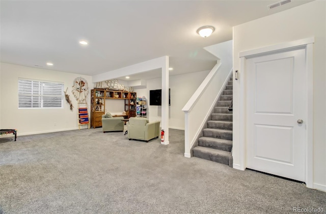 2734 Grand Prix Ct, Colorado Springs, CO 80922 - living room featuring carpet flooring, stairway, baseboards, and recessed lighting