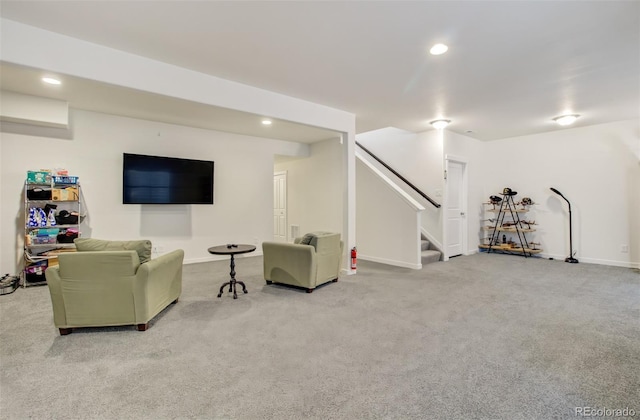 2734 Grand Prix Ct, Colorado Springs, CO 80922 - living room featuring carpet flooring, recessed lighting, stairs, and baseboards