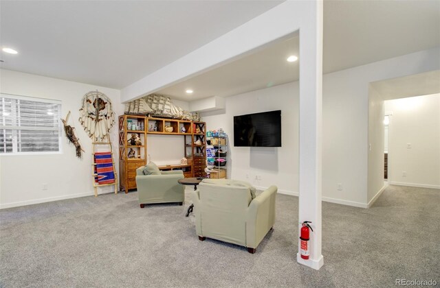 2734 Grand Prix Ct, Colorado Springs, CO 80922 - living room with carpet floors, recessed lighting, baseboards, and beam ceiling