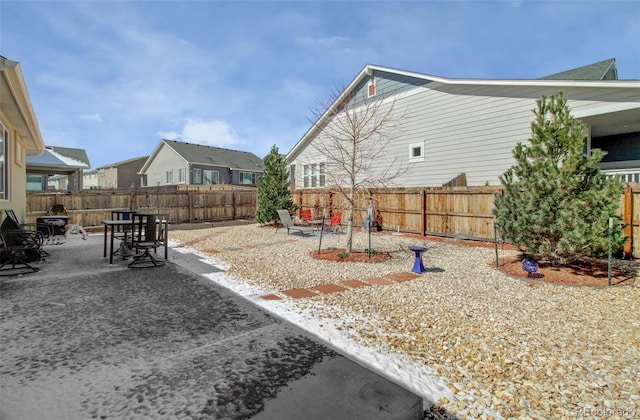 2734 Grand Prix Ct, Colorado Springs, CO 80922 - fenced backyard with a patio