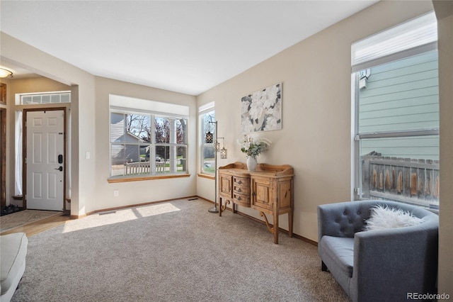 9684 W Long Dr, Littleton, CO 80123 - foyer entrance featuring baseboards and carpet flooring