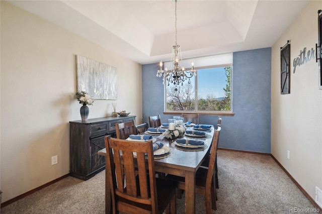 9684 W Long Dr, Littleton, CO 80123 - dining area featuring carpet floors, a chandelier, a tray ceiling, and baseboards