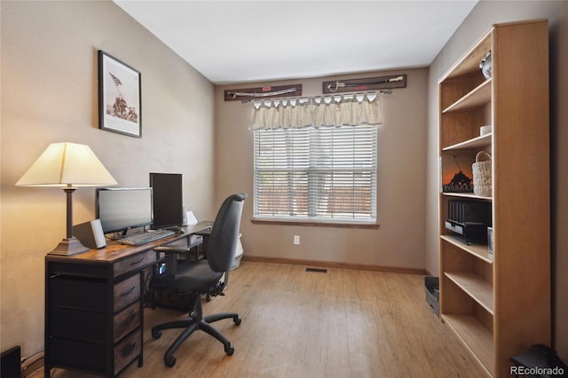 9684 W Long Dr, Littleton, CO 80123 - office area with wood finished floors and baseboards