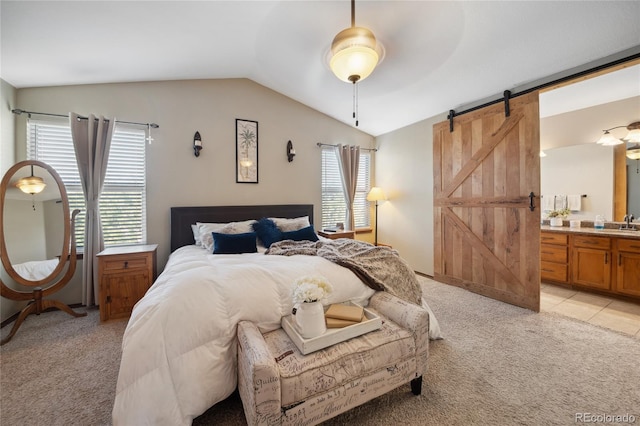 9684 W Long Dr, Littleton, CO 80123 - bedroom with a barn door, light carpet, multiple windows, and vaulted ceiling