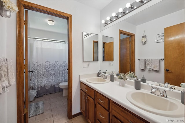 9684 W Long Dr, Littleton, CO 80123 - bathroom featuring toilet, double vanity, tile patterned flooring, and a shower with curtain