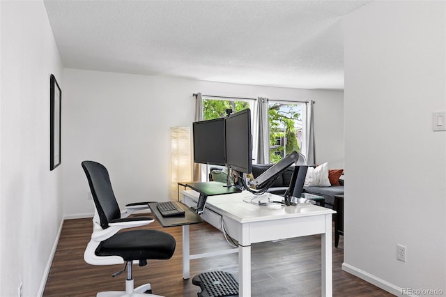 11041 Newland St, Westminster, CO 80020 - office area with wood finished floors, a textured ceiling, and baseboards