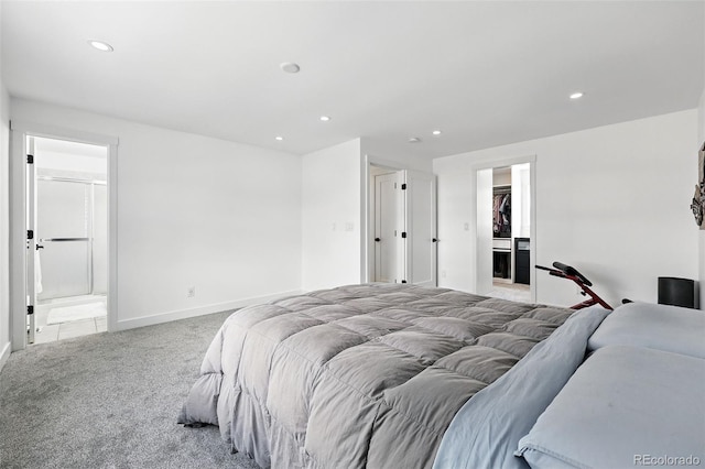 11041 Newland St, Westminster, CO 80020 - carpeted bedroom featuring recessed lighting, baseboards, and ensuite bath