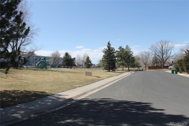 view of road featuring curbs