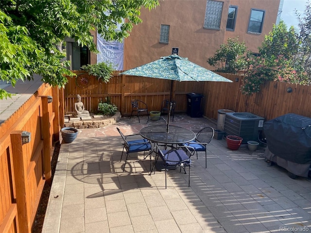 1038 E 4th Ave, Denver, CO 80218 - view of patio featuring area for grilling and outdoor dining area
