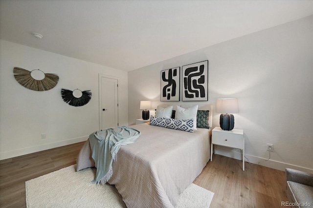 116 Monarch St, Louisville, CO 80027 - bedroom featuring wood finished floors and baseboards