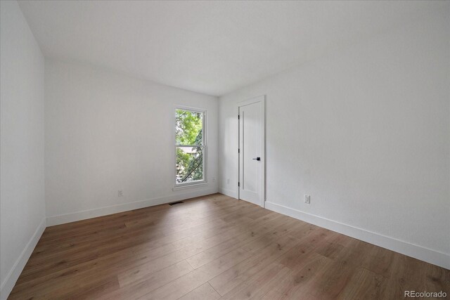 116 Monarch St, Louisville, CO 80027 - unfurnished room with wood finished floors and baseboards