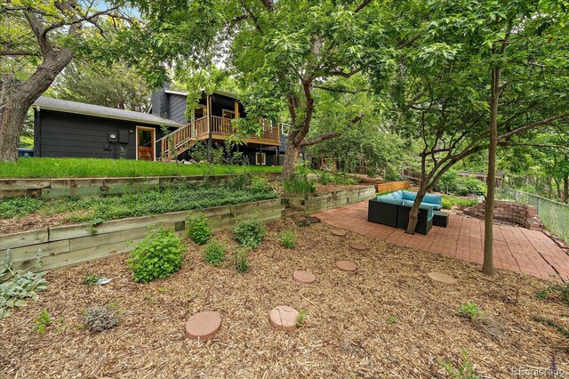 116 Monarch St, Louisville, CO 80027 - view of yard with stairs, a deck, and a patio area