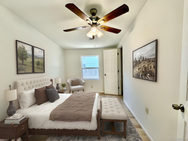 bedroom featuring ceiling fan and wood-type flooring