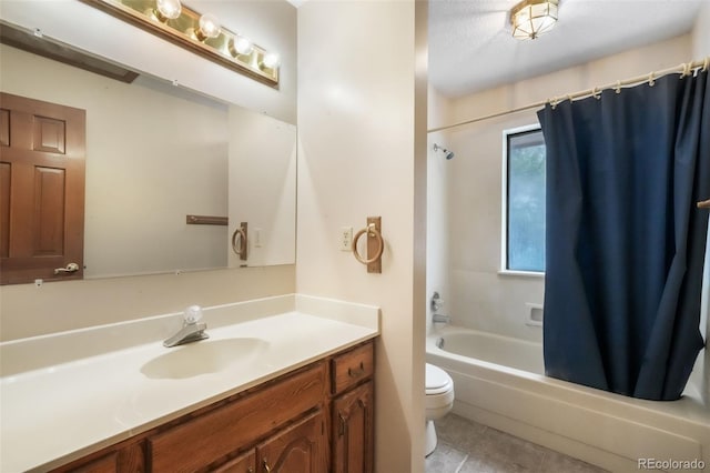 full bathroom with toilet, shower / bath combo with shower curtain, vanity, and tile patterned floors