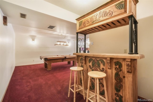 indoor dry bar with carpet flooring and billiards