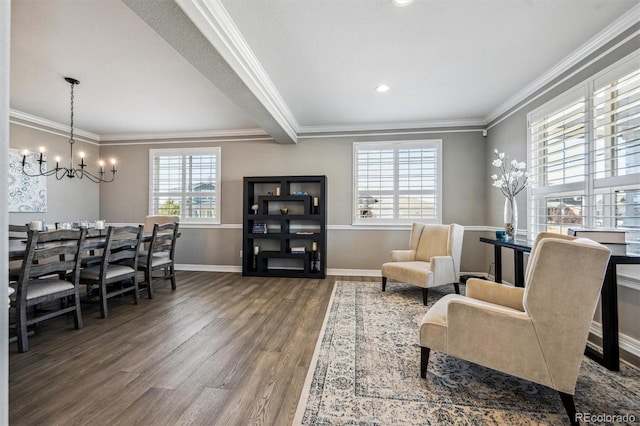 sitting room featuring dark wood-style floors, a chandelier, crown molding, and baseboards