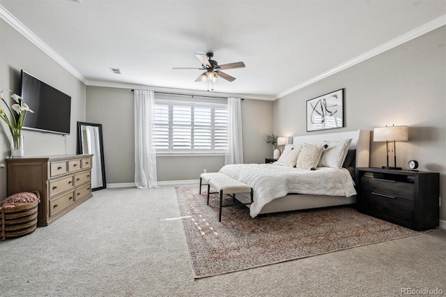 bedroom with baseboards, ornamental molding, ceiling fan, and light colored carpet