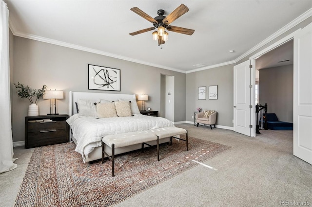 bedroom with a ceiling fan, carpet, ornamental molding, and baseboards