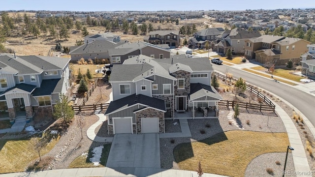 drone / aerial view with a residential view