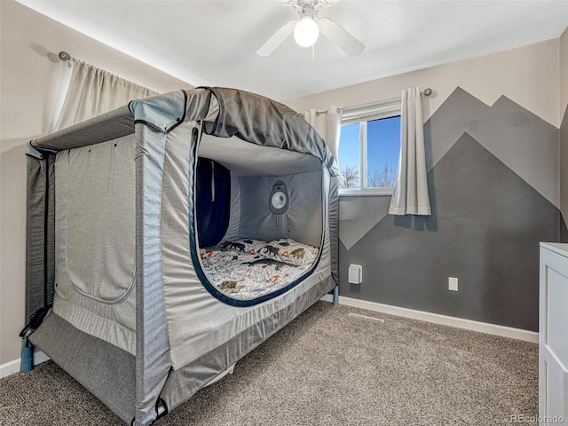 carpeted bedroom featuring ceiling fan and baseboards