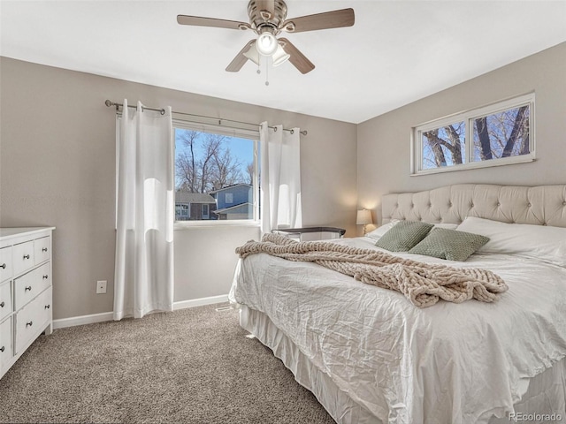 bedroom with carpet, ceiling fan, and baseboards