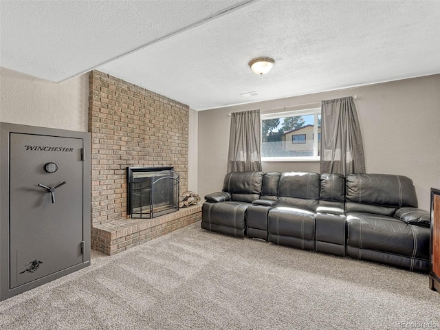 living room featuring carpet floors, a brick fireplace, a textured ceiling, and a textured wall