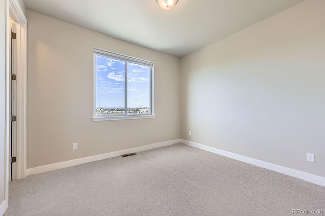 9436 E 57h Ave, Denver, CO 80238 - carpeted spare room featuring baseboards